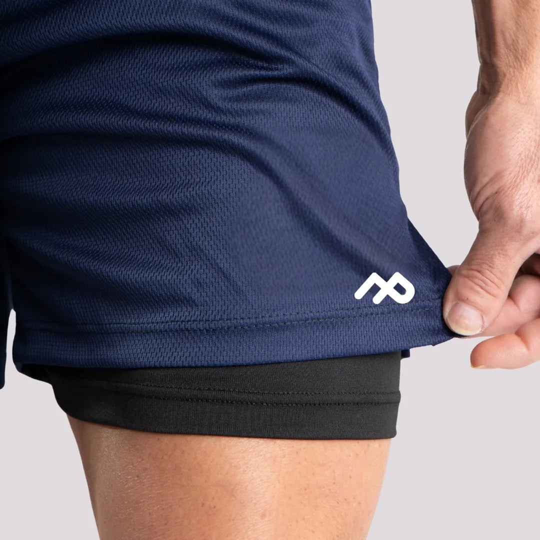 shorts-azul-compressao-bolso-celular-speed-run.webp