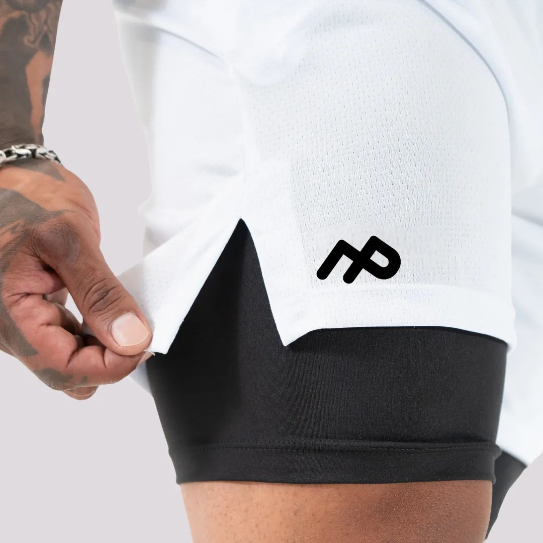 shorts-branco-compressao-bolso-celular-speed-run.webp