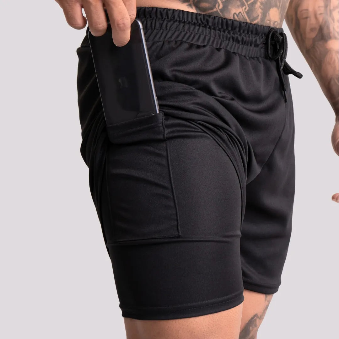 shorts-2em1-compressao-preto-corrida-speed-run.webp